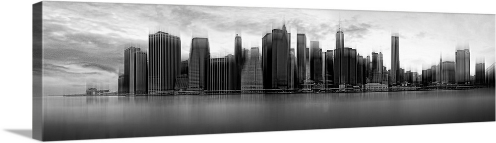 Black and white panoramic view of the skyscrapers of New York City on a cloudy day.