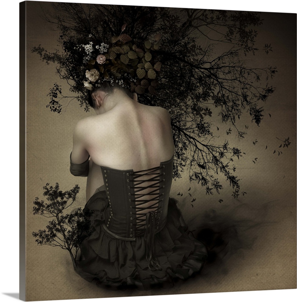 Conceptual image of a woman with branches and flowers in her hair.