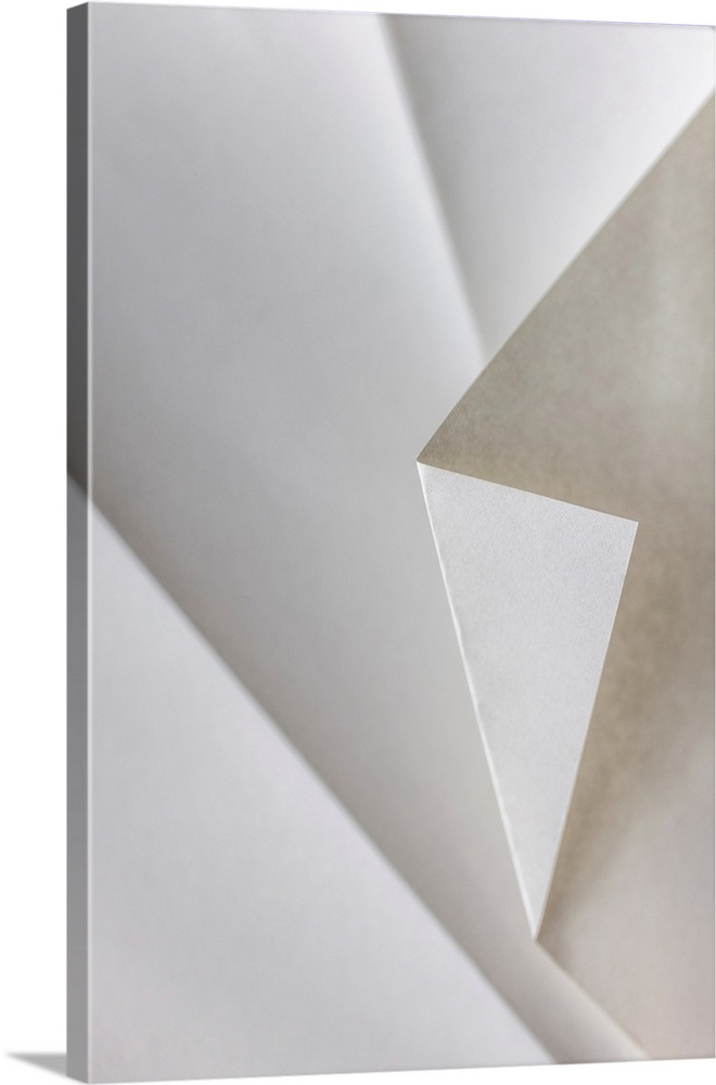 A close up photograph of a folded piece of origami paper
