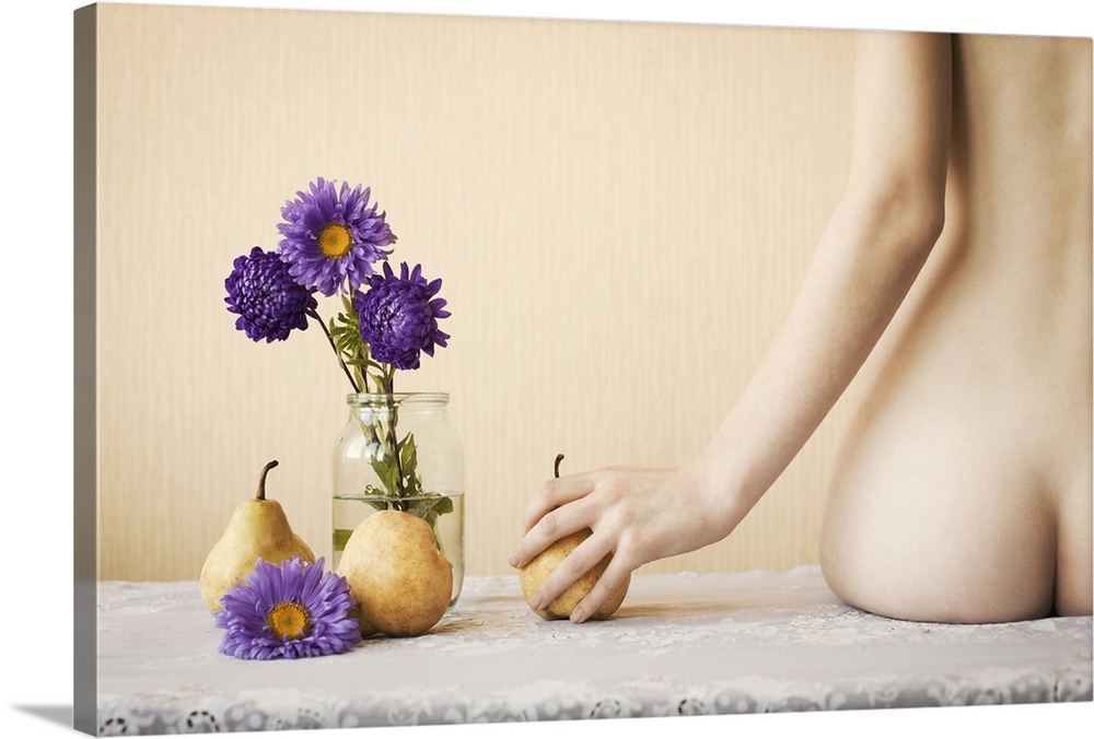 A nude woman's derriere mimics the pears next to her.