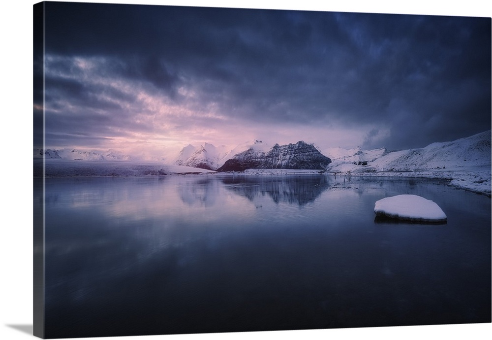 Lavender light over a glacial lake in Iceland.
