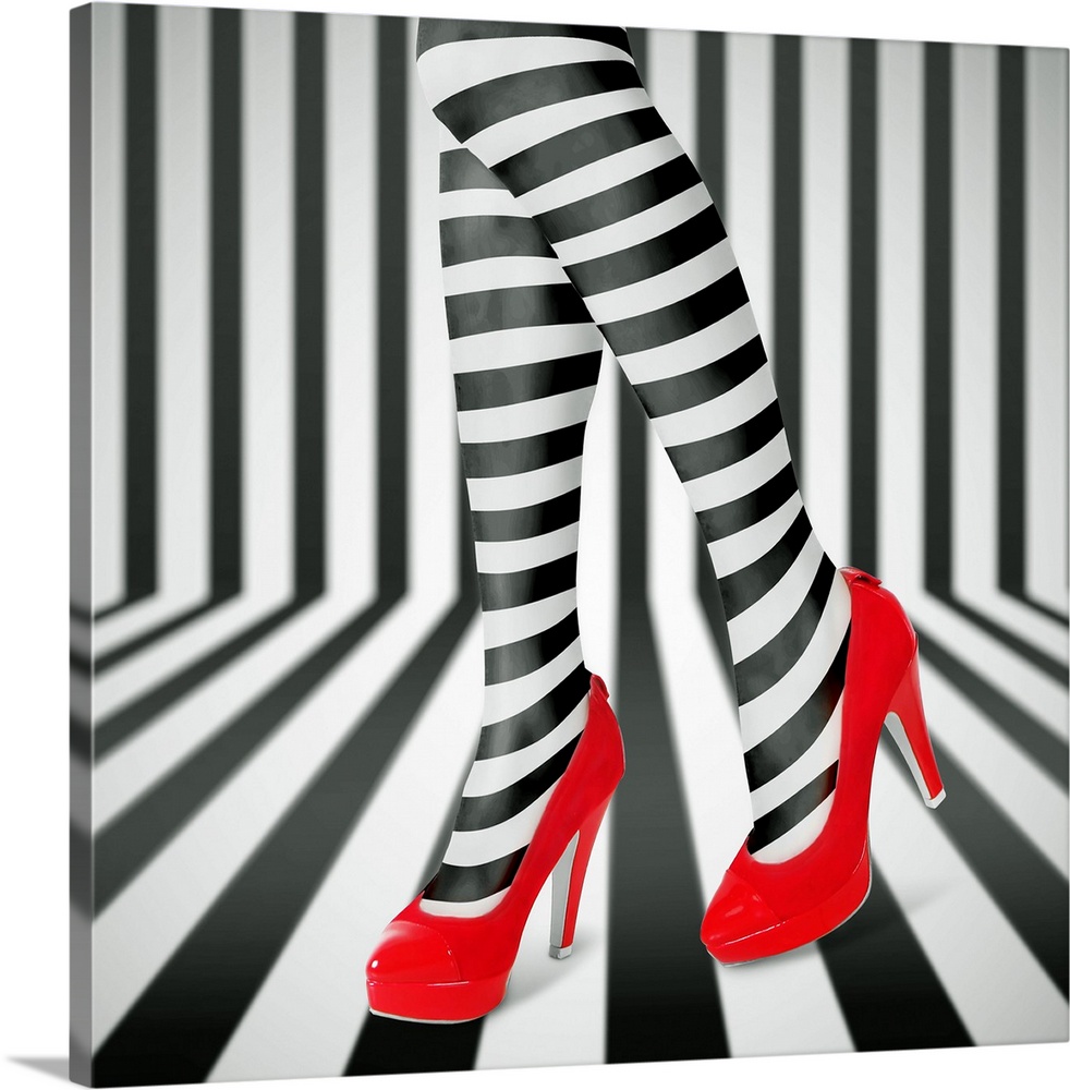 Woman's legs wearing black and white striped leggings and bright red high heels, against a matching striped background.