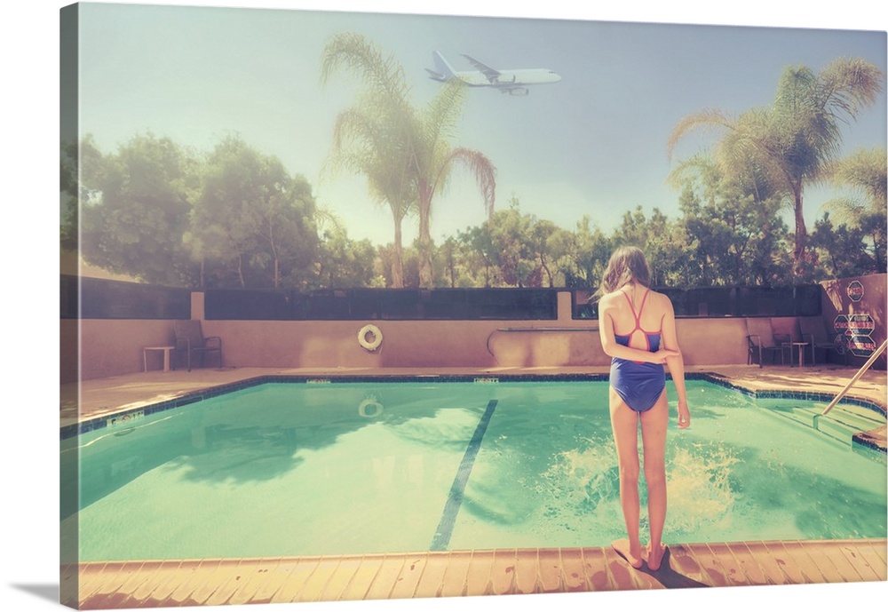 A young girl looking at a pool in suburban Los Angeles.