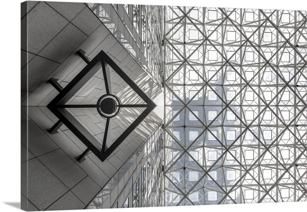 Looking up at an abstract architectural framework design.