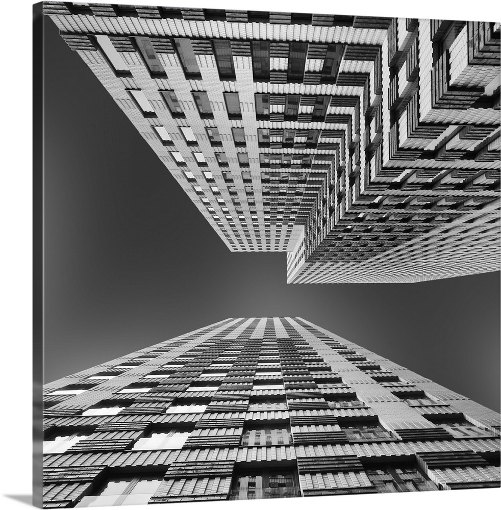 Black and white image of skyscrapers seen from the ground, creating an abstract image.