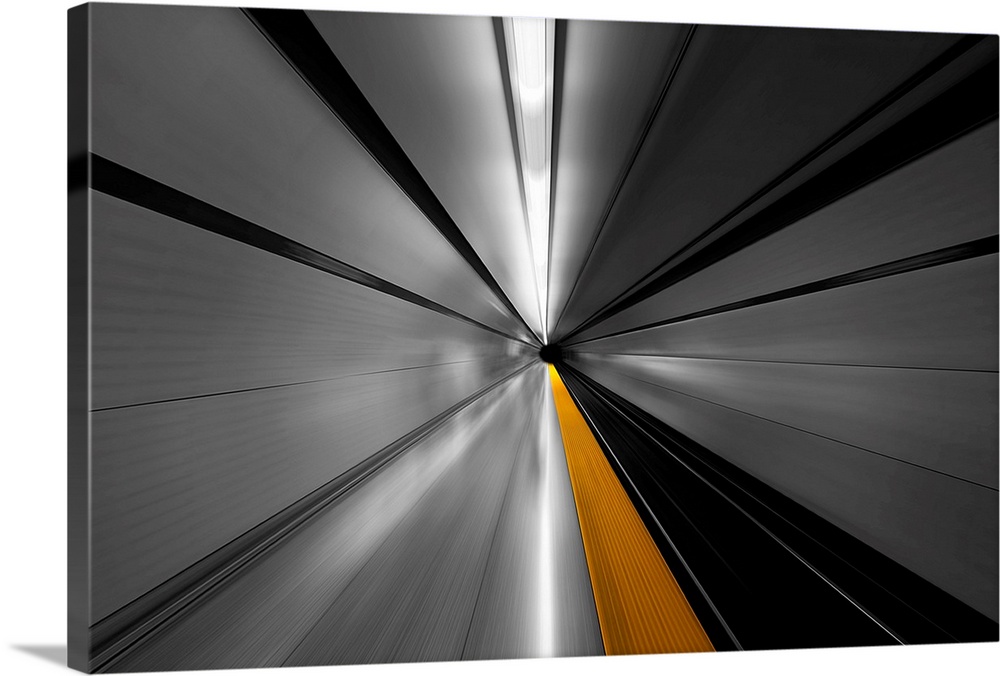 A dynamic motion blurred photograph speeding through a tunnel.