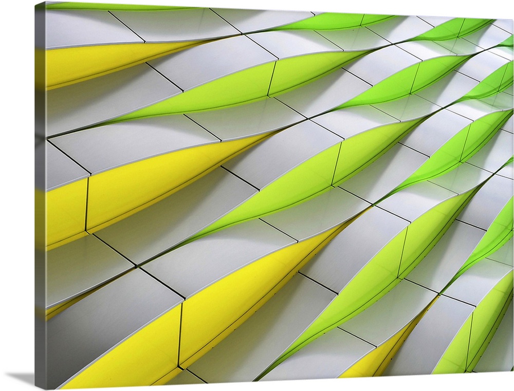 Abstract architecture in green and yellow on the side of the Medical University of Groningen, Netherlands.