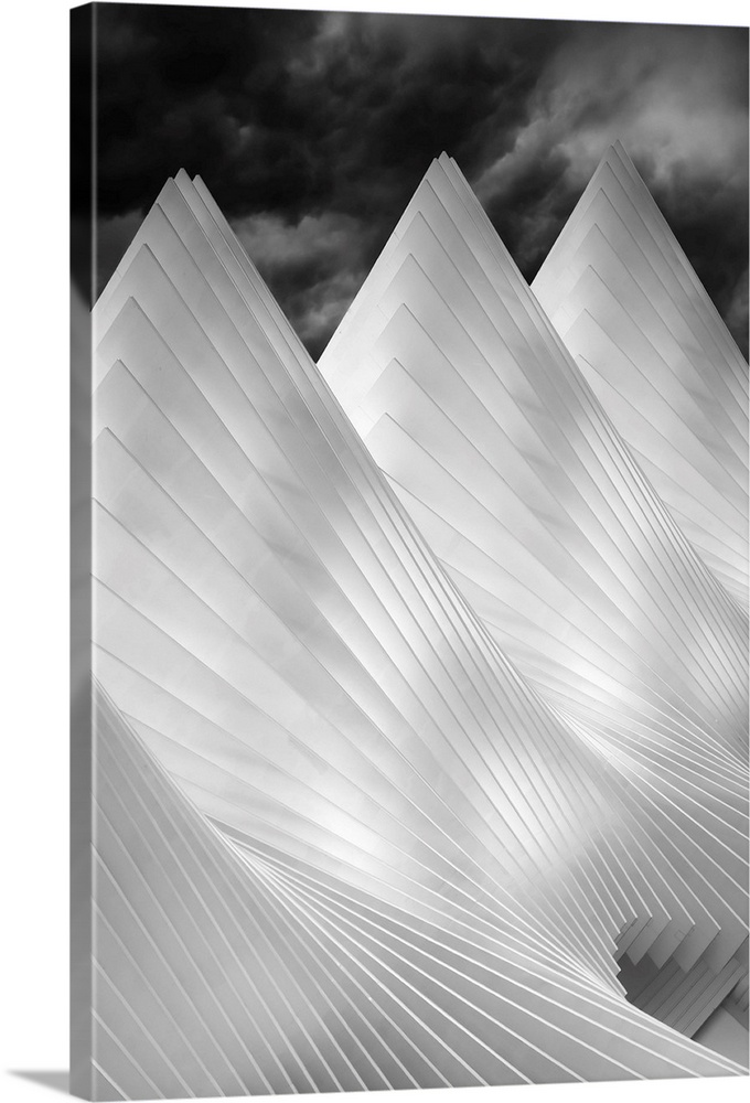 A black and white photograph of conical architectural attributes.
