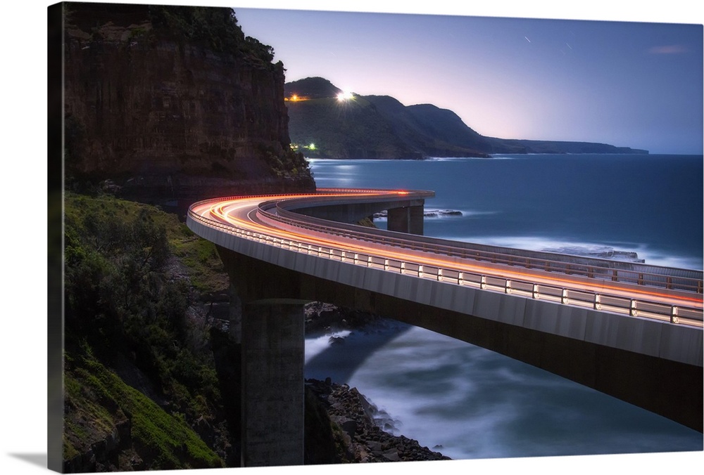 Light trails from traffic on the Sea Cliff Bridge near Wollongong, Australia.