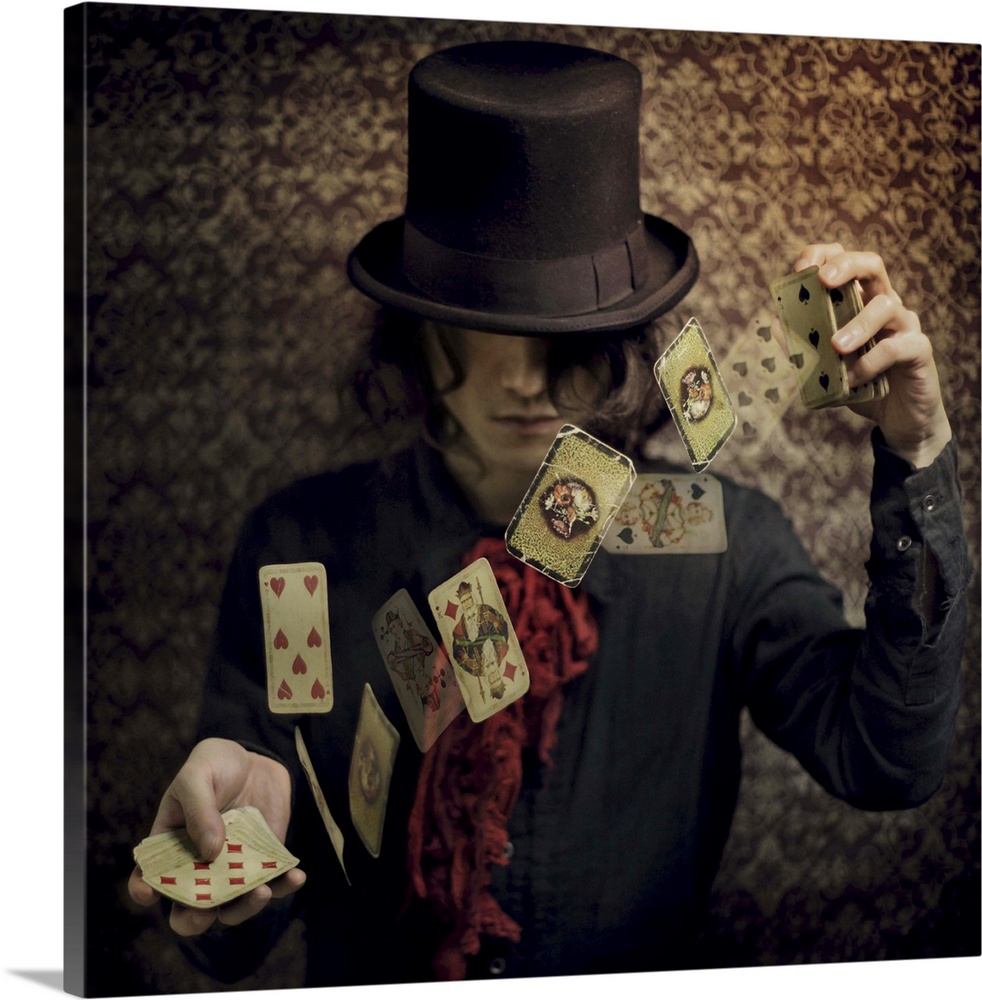 Conceptual image of a magician flipping playing cards in the air.