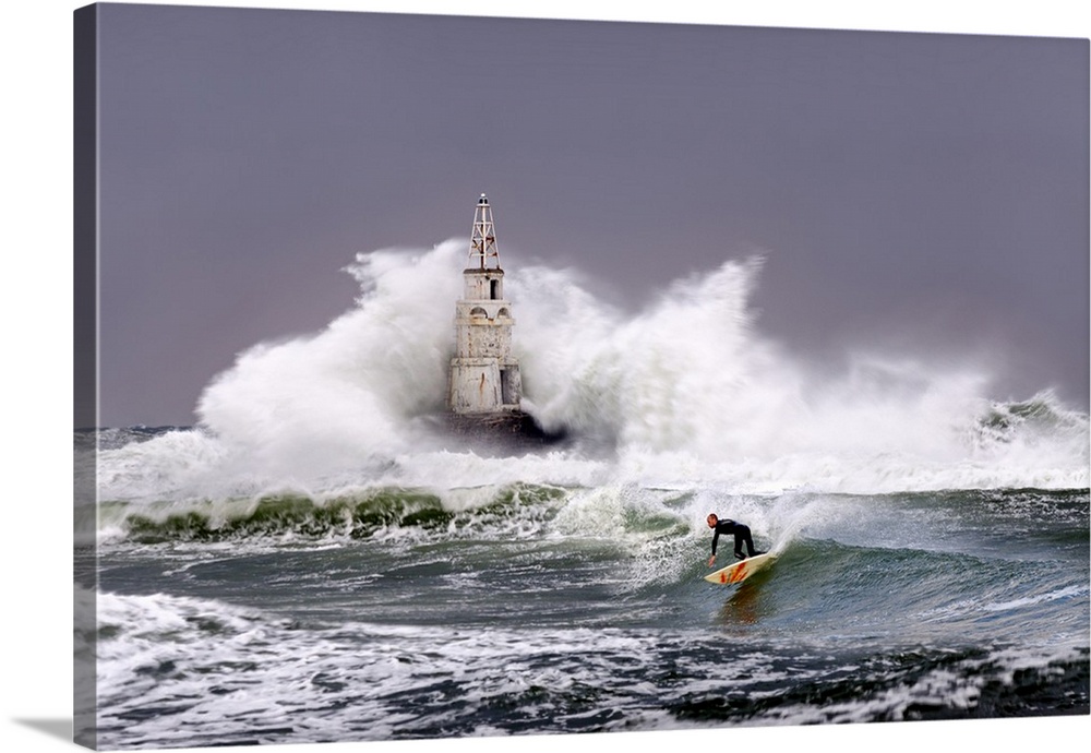 Storm in the Bay of Ahtopol, Bulgaria, and a surfer