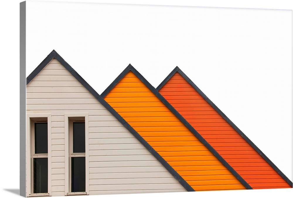Architectural abstract photograph of three a-frame structures in white and shades of orange.