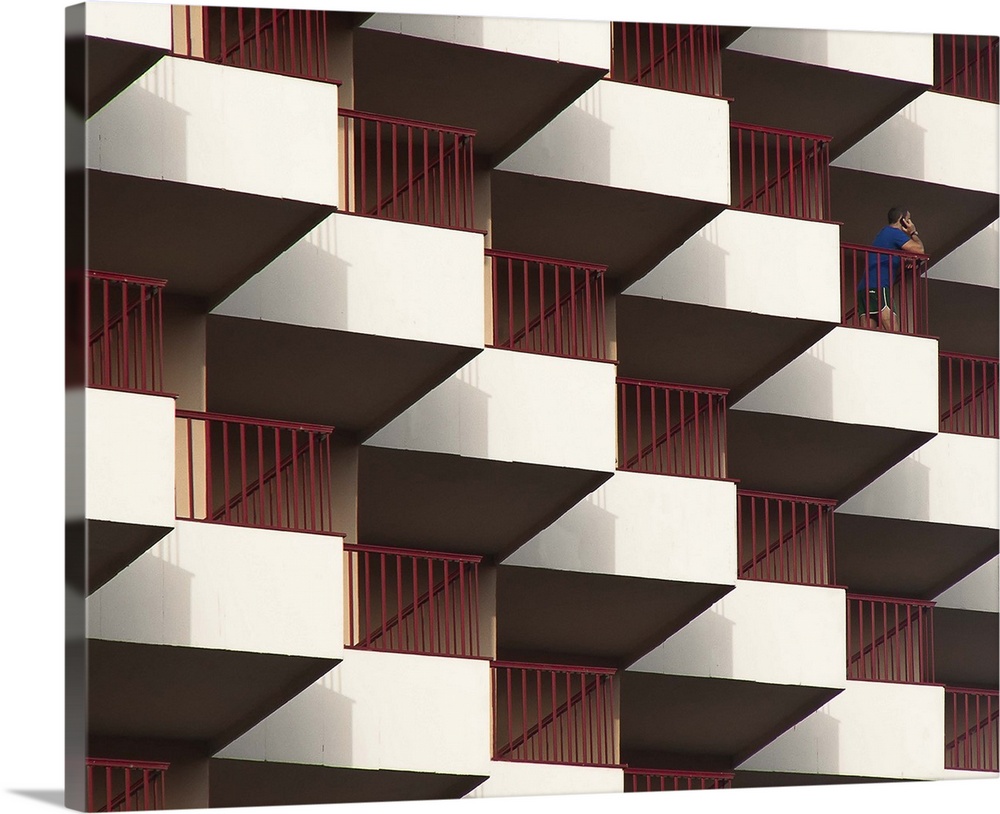 Railings and balconies of an apartment building, creating in abstract repeating pattern, Fuengirola, Spain.