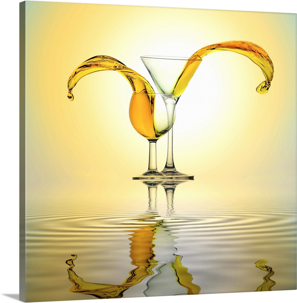 Conceptual image of two glasses with orange liquid spilling out of them.