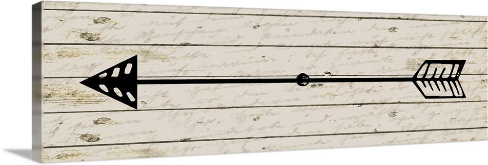A black arrow pointing to the left on a wood background with faded script.