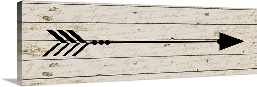A black arrow pointing to the right on a wood background with faded script.