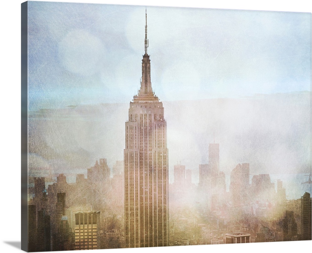 Fine art photo of the Empire State Building in New York City rising above the city skyline.