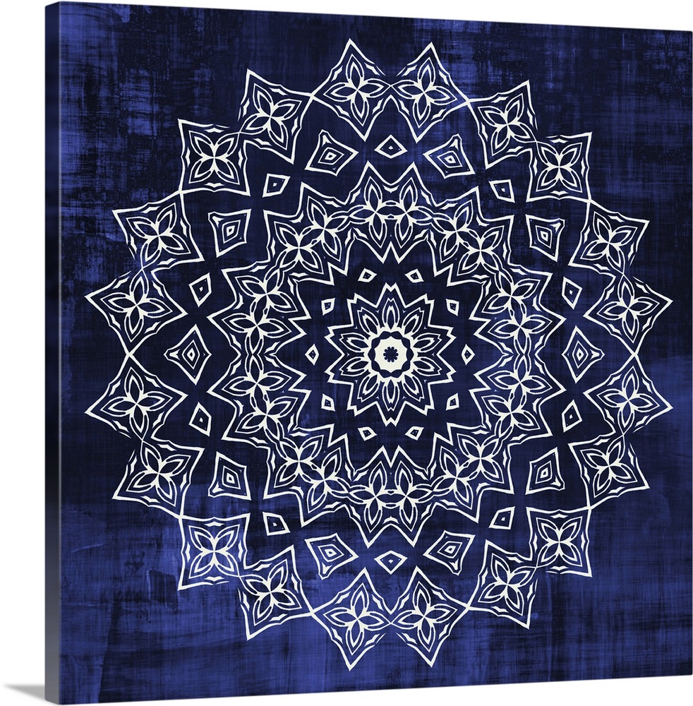 A white symmetrical geometric mandala on an indigo background.