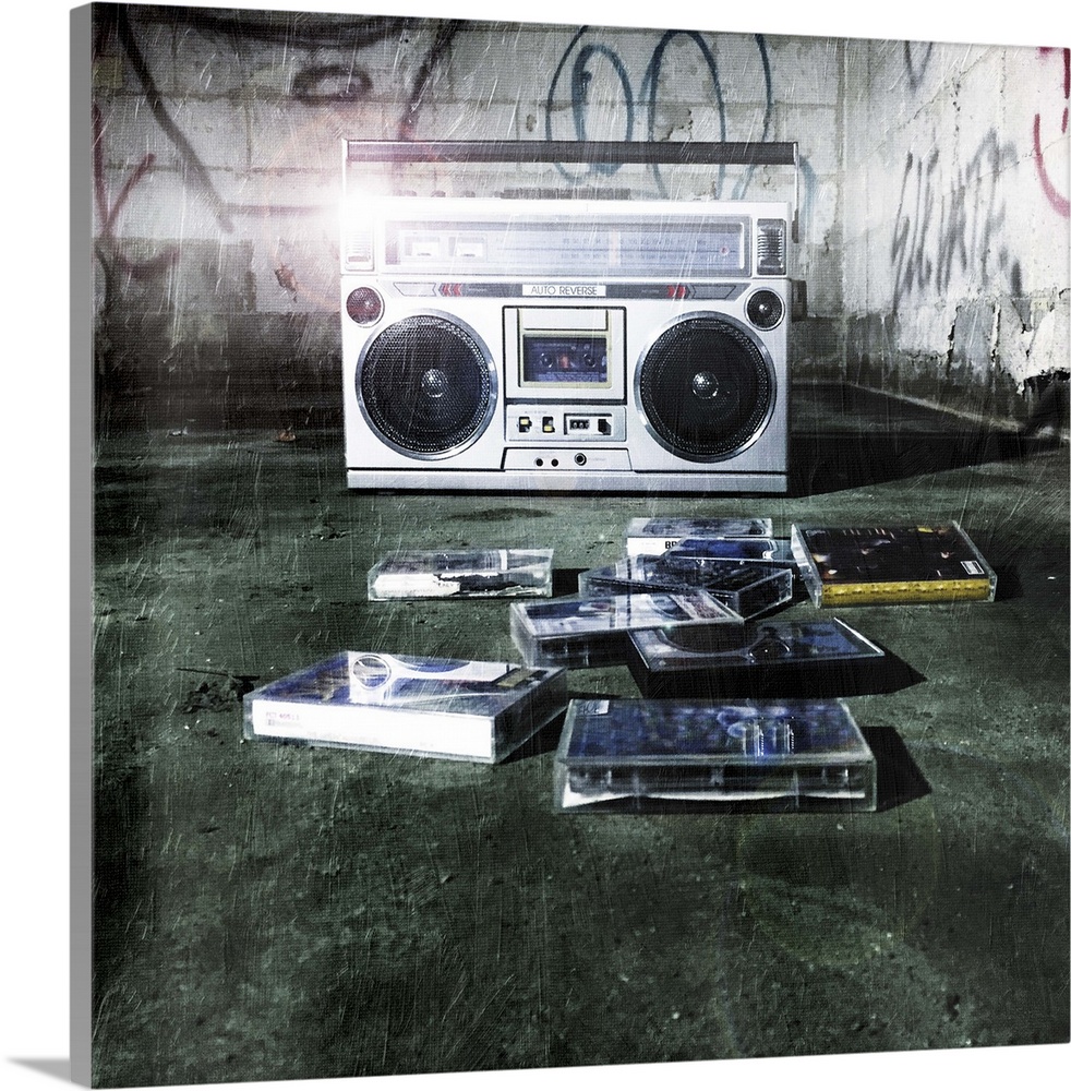 A classic boom box stereo sitting in an abandoned building with old cassette tapes.