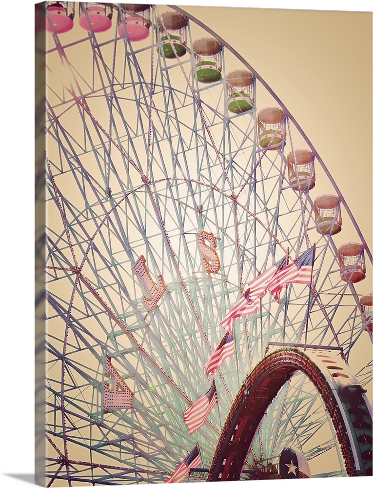 Artistically filtered photograph of a carnival Ferris wheel.