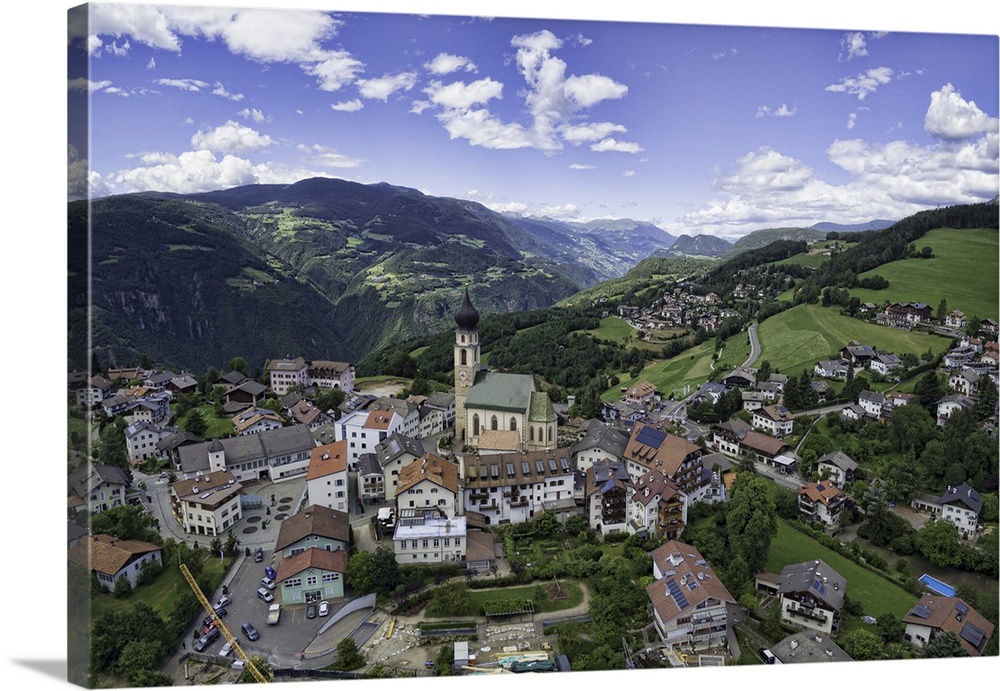 Aerial capture of a church in Vols Am Schlern, Northern Italy.