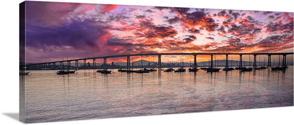 This is a panoramic capture of the Coronado Bridge in San Diego, California, USA. Image taken just as the sun rose across ...