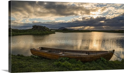 A Boat Lies In A Placid Lake Myvatn, North Iceland At Sunset, Iceland