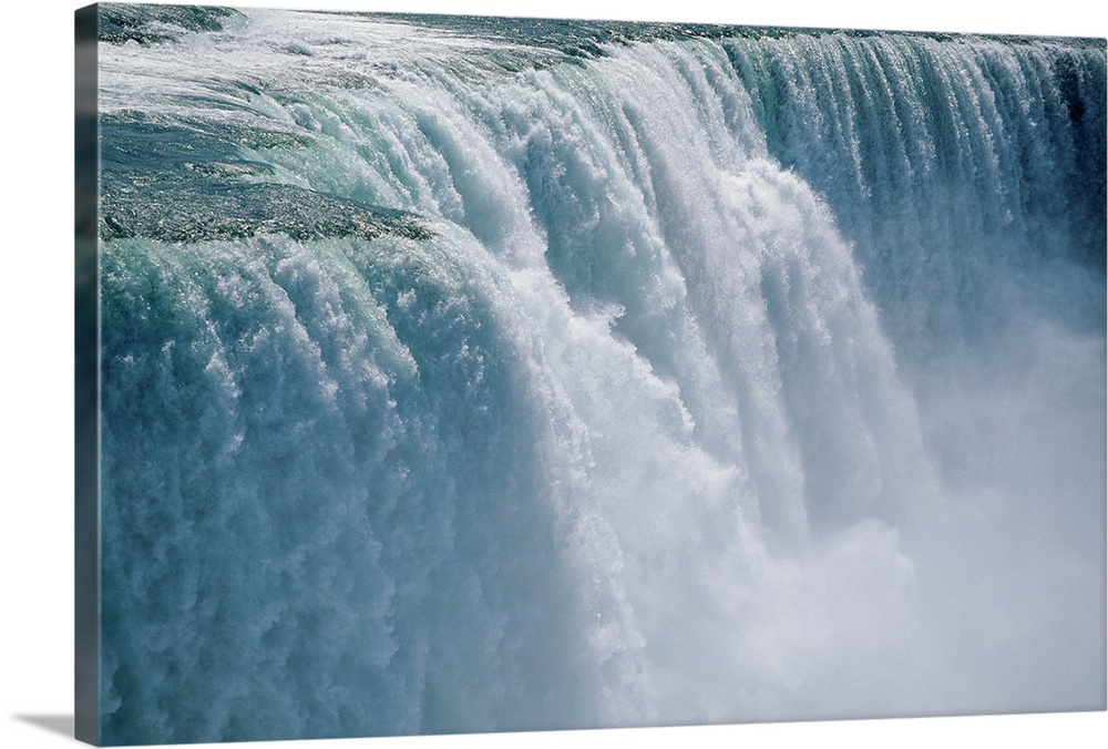 Photograph taken of an immense waterfall in Niagara Falls.