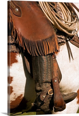 A Close-Up Of A Roper On Horseback