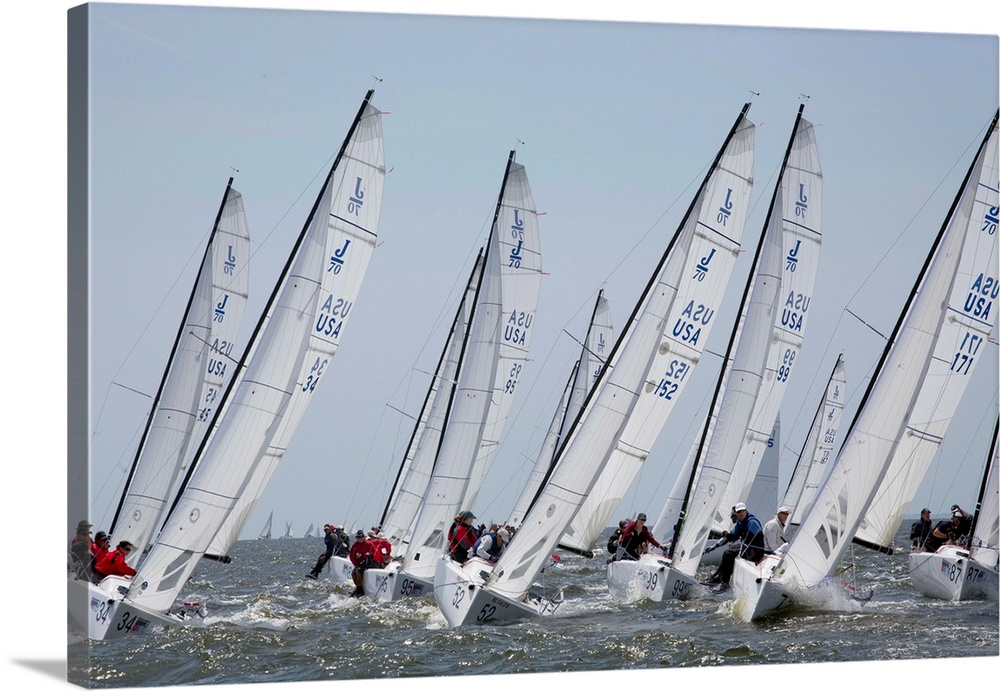 A fleet of J70 Sailboats during a race on the Chesapeake Bay near Annapolis, MD