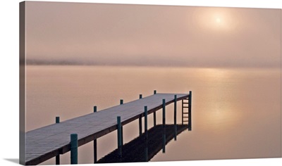 A foggy sunrise over a dock in Lake Whatcom during Winter, Bellingham Washington