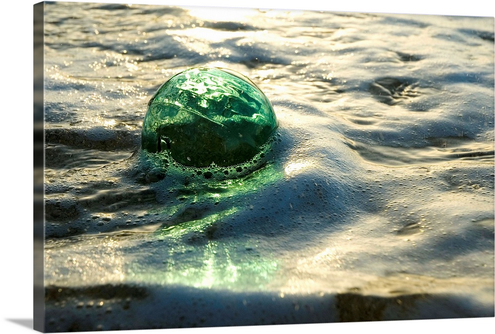 A Glass Fishing Ball Floats in Shallow Water | Large Solid-Faced Canvas Wall Art Print | Great Big Canvas