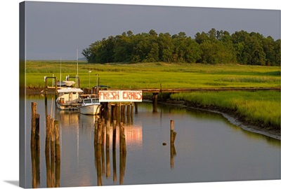 A marsh and boat dock near the York River.; West Point, Virginia.