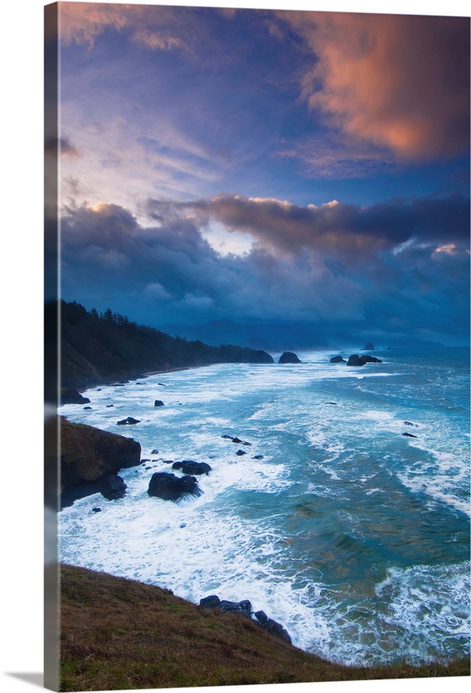 A morning storm brews on the pacific coast in this view from Ecola State Park, near Cannon Beach. Oregon, United States of...