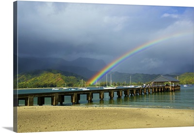 A Rainbow Over Hanalei Pier In Hanalei Bay; Kauai, Hawaii, United States Of America