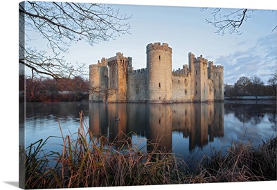 A View Of Bodiam Castle With Reflection In The Water