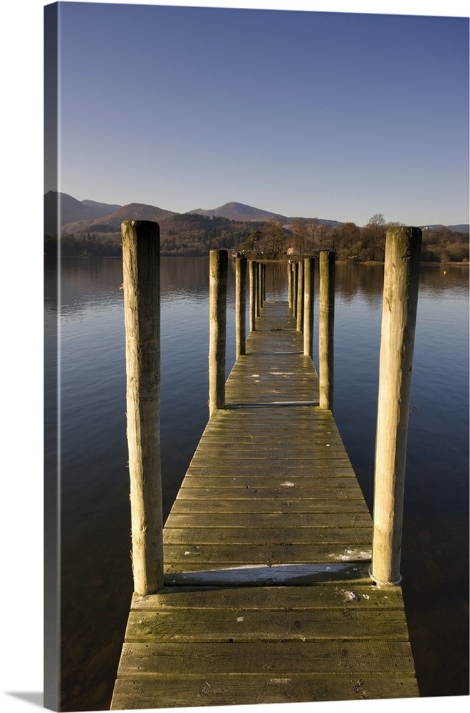 A Wooden Dock Going Into The Lake, Cumbria, England