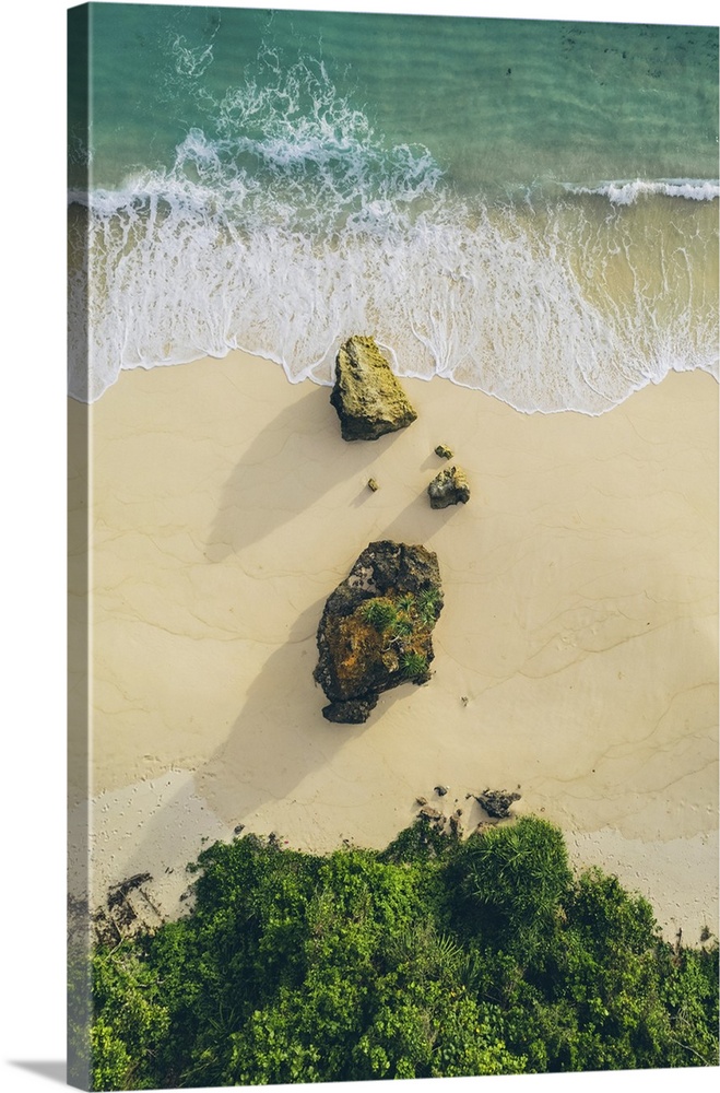 Aerial view of directly above Mbawana beach with white sand and turquoise ocean, east Nusa Tenggara, Indonesia. Kodi Bange...