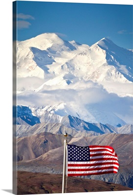 An American flag flys in the wind at Eielson Visitor Center