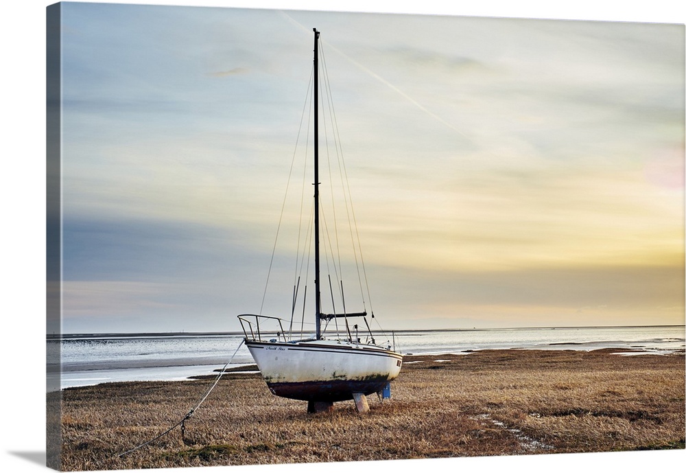 An old sailing yacht on the River Ribble marshes at Lytham St Annes.