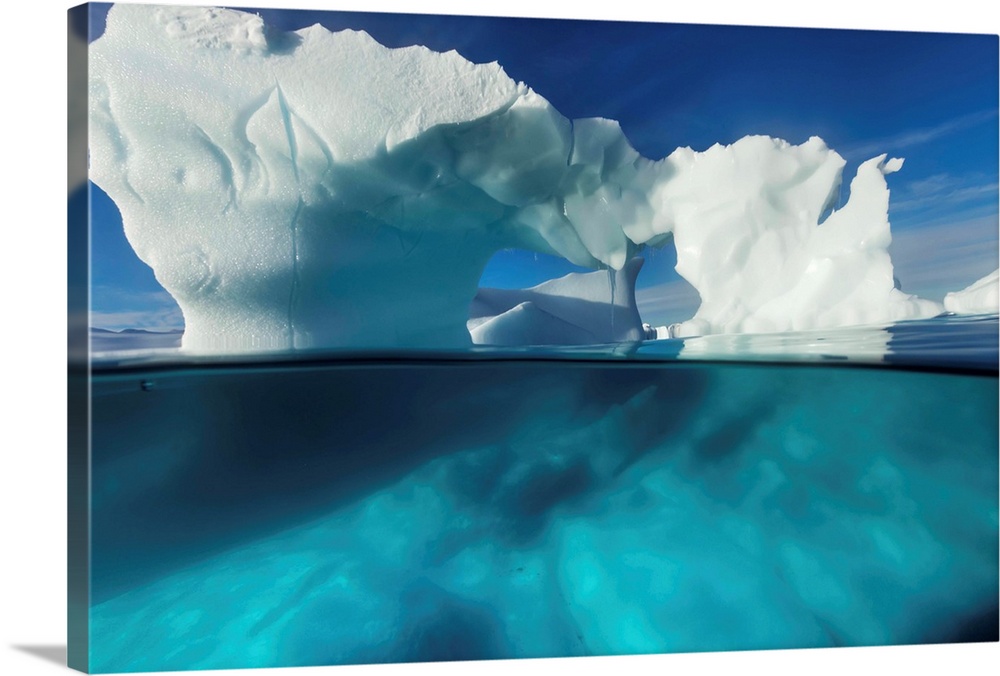 Antarctica, Underwater view of arched Iceberg floating near Enterprise Island on sunny spring morning along Antarctic Peni...