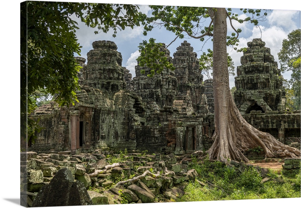 Fallen rocks and trees behind ruined temple, Banteay Kdei, Angkor Wat; Siem Reap, Siem Reap Province, Cambodia