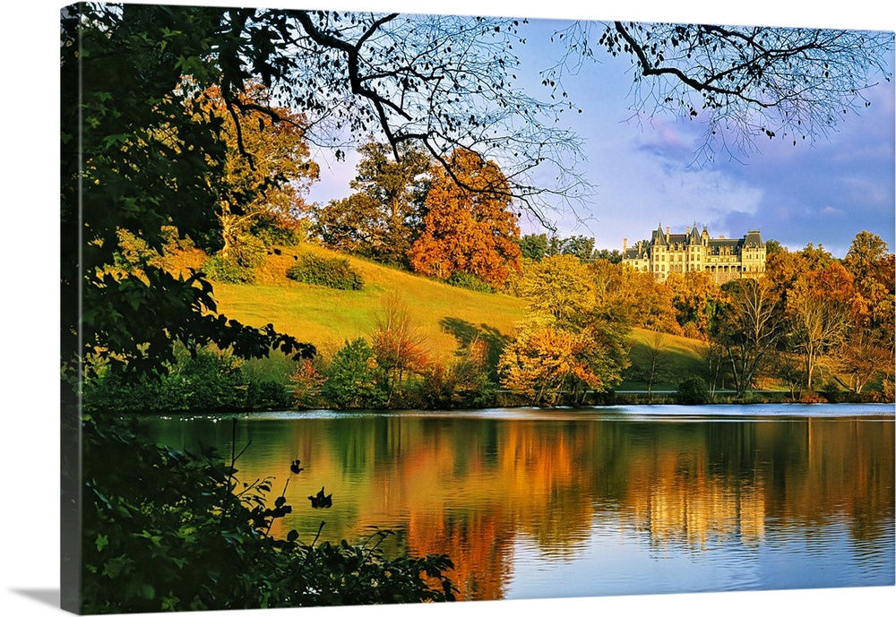 Biltmore Estate is one of Frederick Law Olmsted's finest landscapes and includes a six-acre lagoon that reflects the majes...