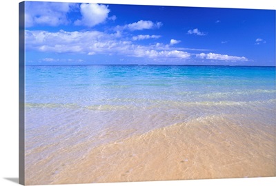 Blue Sky With Clouds, Calm Shoreline, Turquoise Water On Horizon