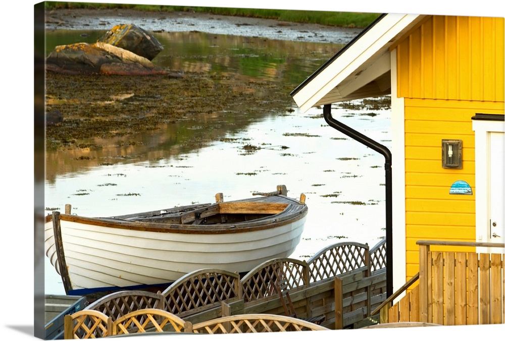 Boat And Traditional House On Flaton Island