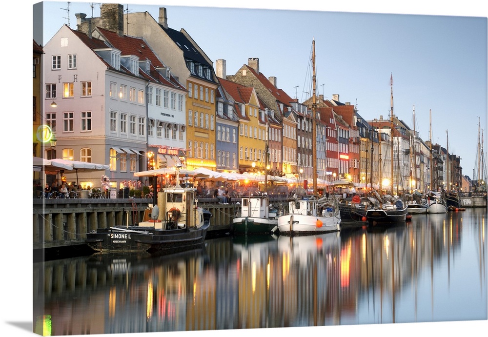 Boats and townhouses along the Nyhavn canal in Copenhagen.