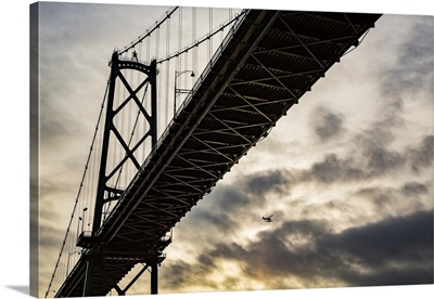 Bridge At Sunset With An Airplane Flying, Vancouver, British Columbia, Canada