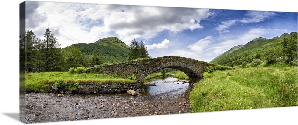 Panoramic view of Butter Bridge over Kinglas Water in the Loch Lomond National Park in Scotland.
