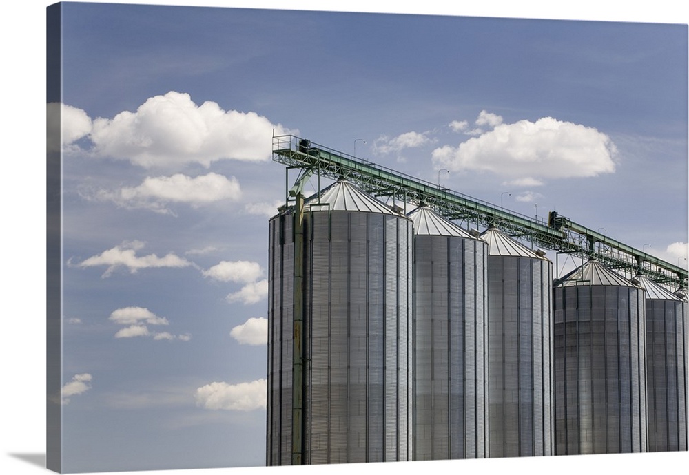 Calgary, Alberta, Canada; A Row Of Large Grain Bins