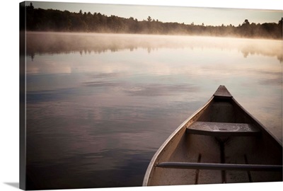 Canoe In Morning Fog On Duck Lake; Kirkfield, Ontario, Canada
